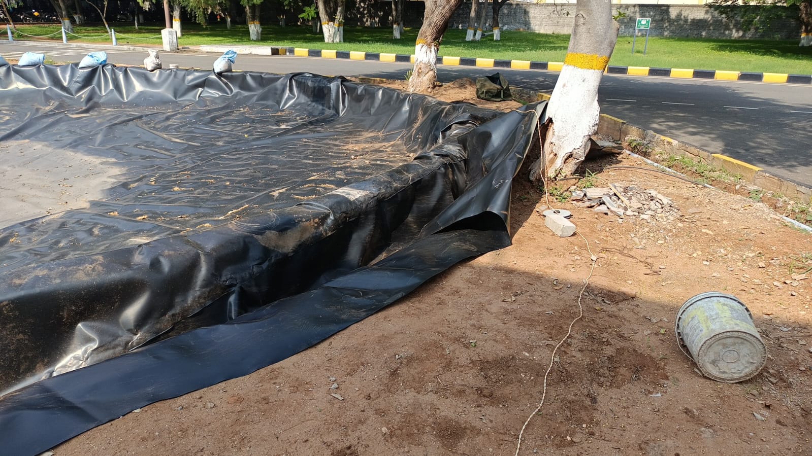HDPE Pond Liner Installation – Blue and Black – Verdant Farms India